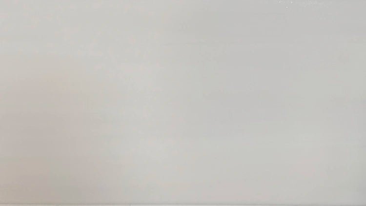 Close-up of Bianco Dolomite subway tiles in 6x12 format, highlighting their smooth white tones, suitable for upscale residential and commercial projects.