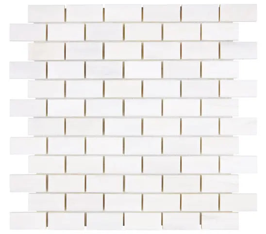 Bianco Dolomite 1x2 polished marble mosaic tile for elegant backsplashes and shower walls.