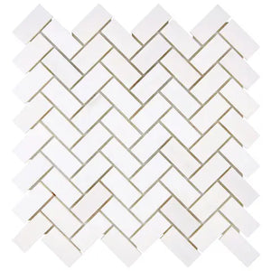 Bianco Dolomite polished 1×2 herringbone marble mosaic.