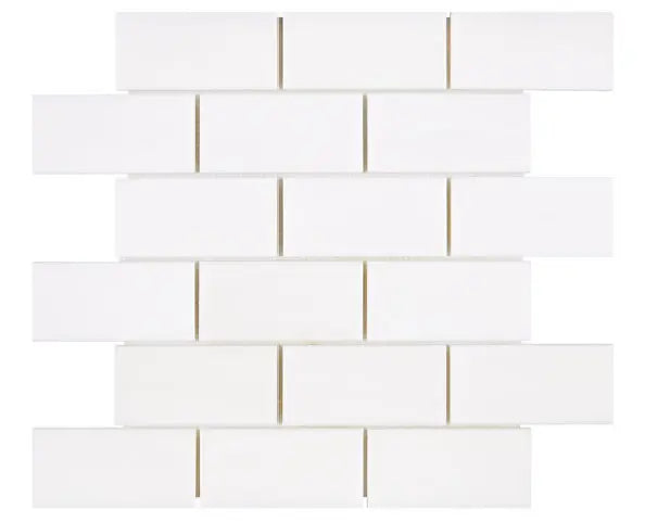 Bianco Dolomite 2 x 4 polished marble mosaic tile for elegant kitchen backsplashes and bathroom floors.