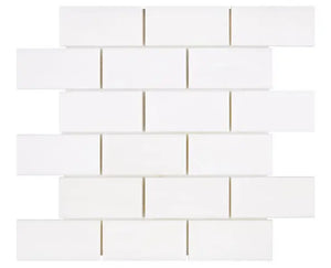 Bianco Dolomite polished 2×4 brick marble mosaic.