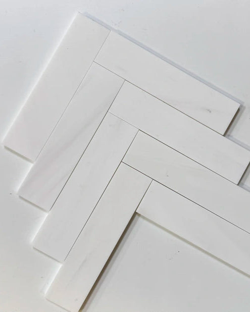 Bianco Dolomite 2×8 inches marble subway tile finish or layout view.