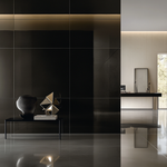 Essentials Glazed Porcelain Tile:  Wall and floor application in Obsidian Black polished finish