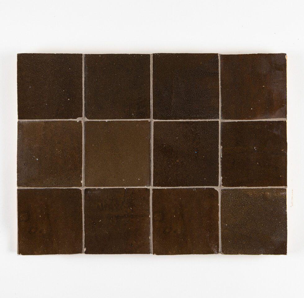 Square zellige tiles with a brownish color pattern on a white background
