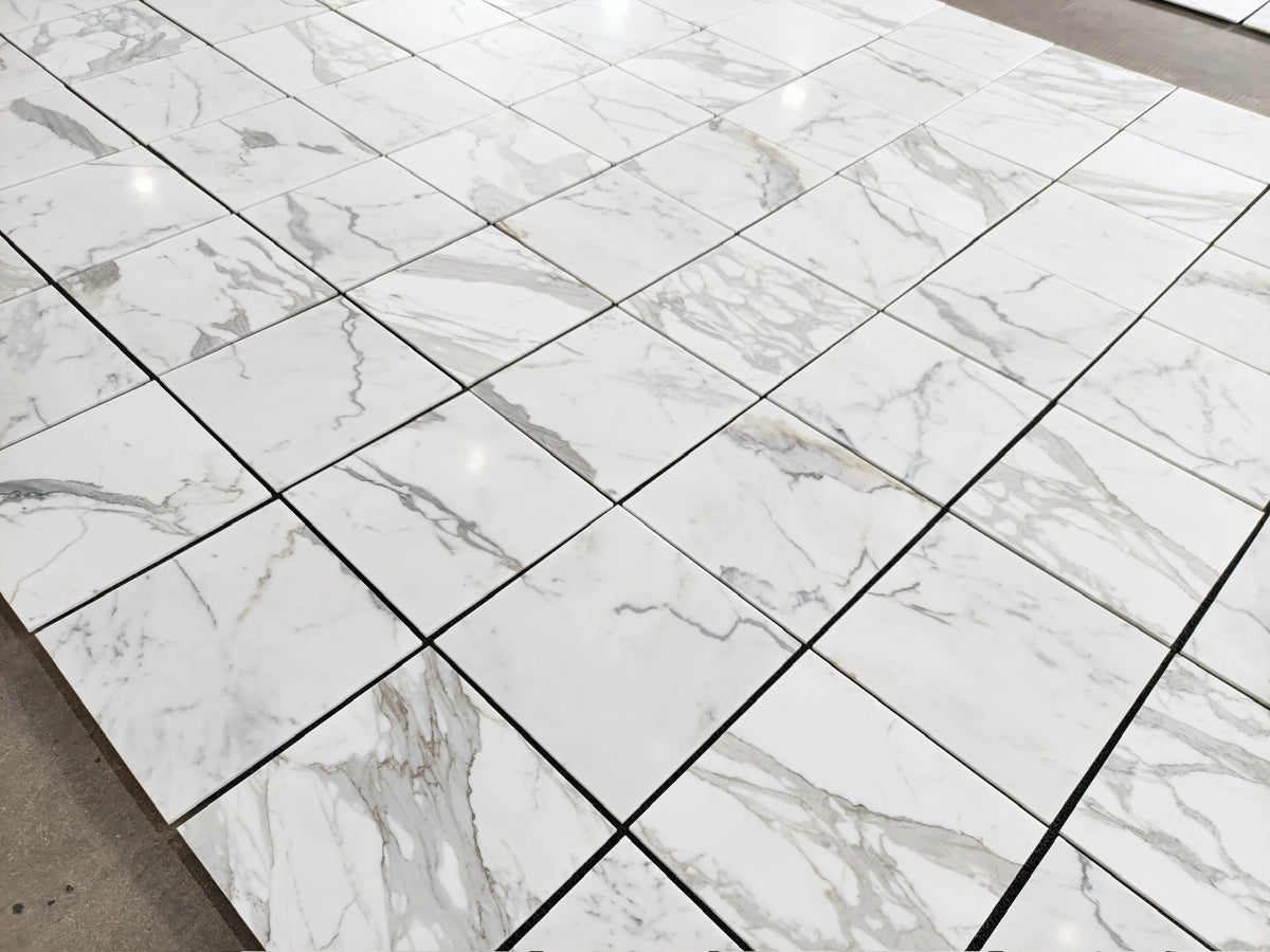 Honed Calacatta Gold Marble Tile 18×18 – Matte Finish for Elegant Interior Spaces