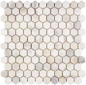 Calacatta Gold marble 1-inch hexagon mosaic with a honed finish.