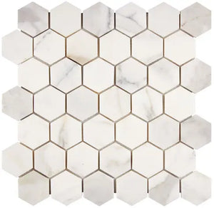 Calacatta Gold honed 2-inch hexagon marble mosaic.
