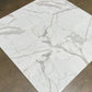 Calacatta Gold Marble Tile dry-lay showcasing luxury main floor selection from in-stock inventory
