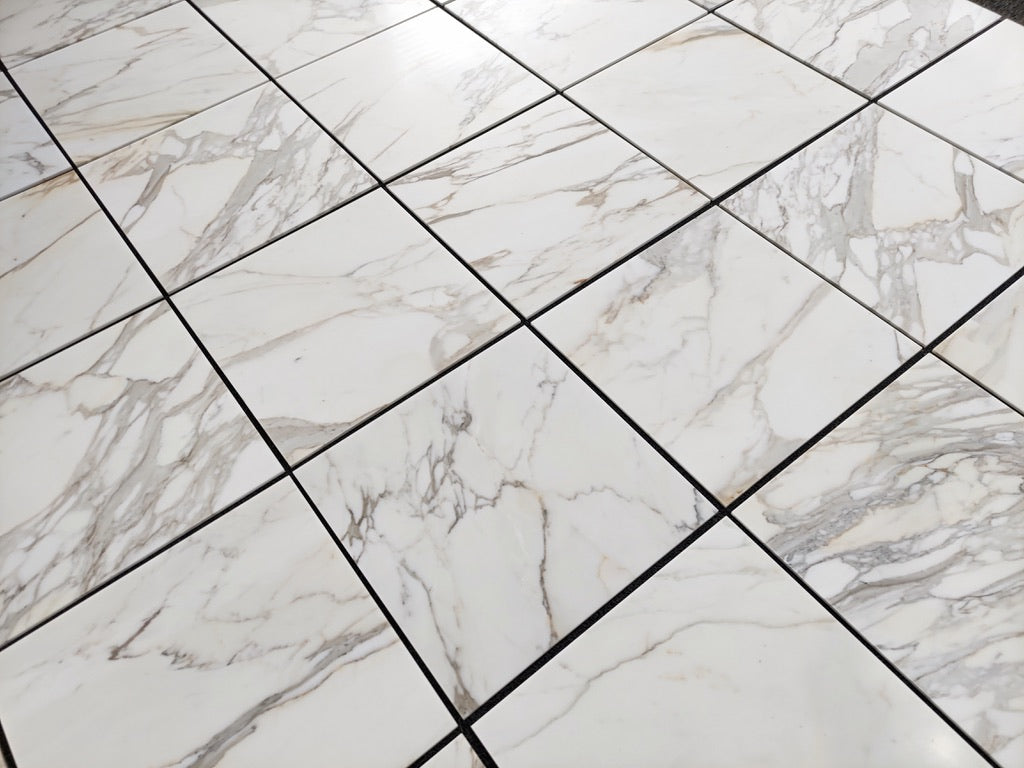 Calacatta Gold honed 24×24 inches marble tile.