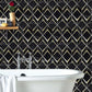 Bathroom wall showcasing Obsidian Shine Dark and reflective black marble and glass for dramatic, bold interiors.