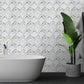 Bathroom wall showcasing Luminous Frost, A radiant blend of white marble and glass, ideal for creating crisp and clean designs.