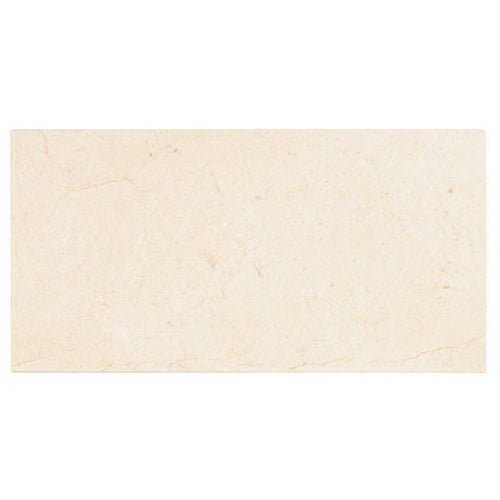 Crema Marfil marble 3×6 subway tile in a polished or honed finish.