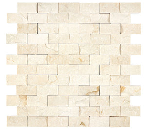 Crema Marfil 1×2 split-face mosaic installed as a dimensional wall accent.