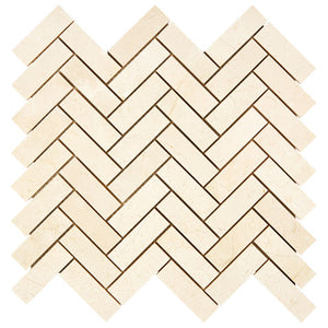 Crema Marfil honed 1 x 3 herringbone mosaic tile for modern shower walls and decorative accents.