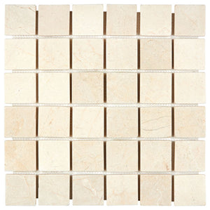 Crema Marfil honed 2×2 square marble mosaic.