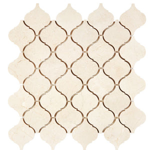 Crema Marfil honed arabesque marble mosaic.