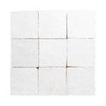 White zellige 4x4 tile with brown grout on a white background