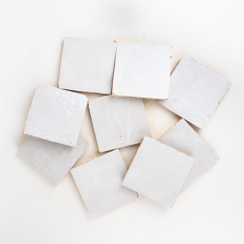 White square zellige tiles on a white background