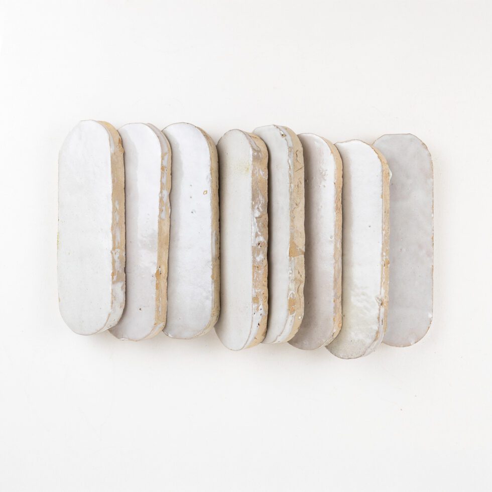 Set of six zellige tiles on a white background