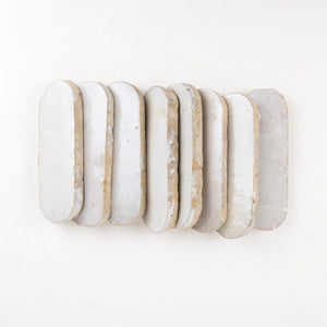 Set of six zellige tiles on a white background