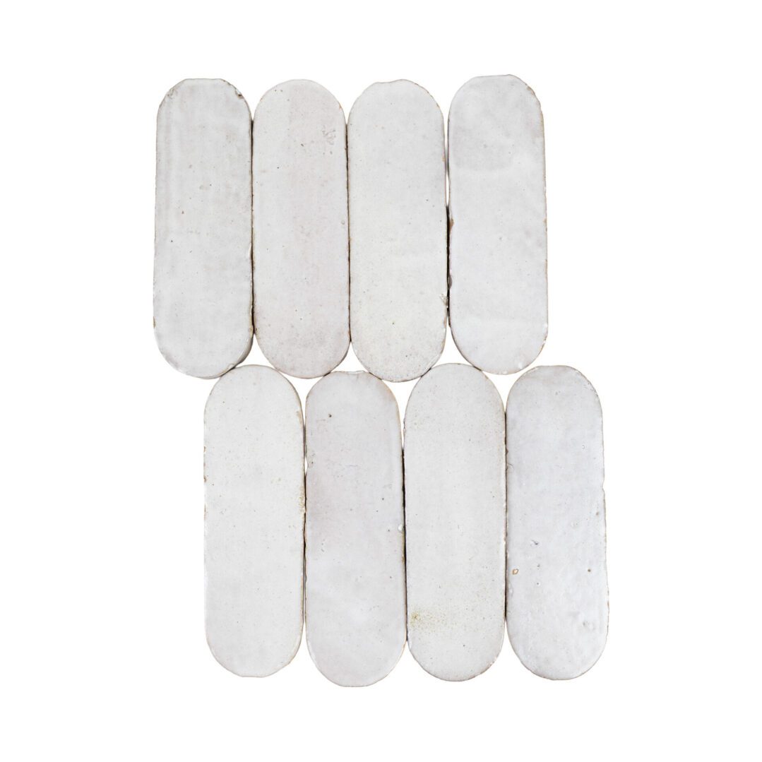 White oval zellige mosaic tile arranged in a grid pattern on a white background