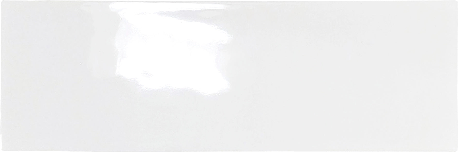 Fez Collection_Zellige Inspired Ceramic Tile:Ivory Breeze glossy ceramic tile from close-up image the Fez Collection, 2x6 size.