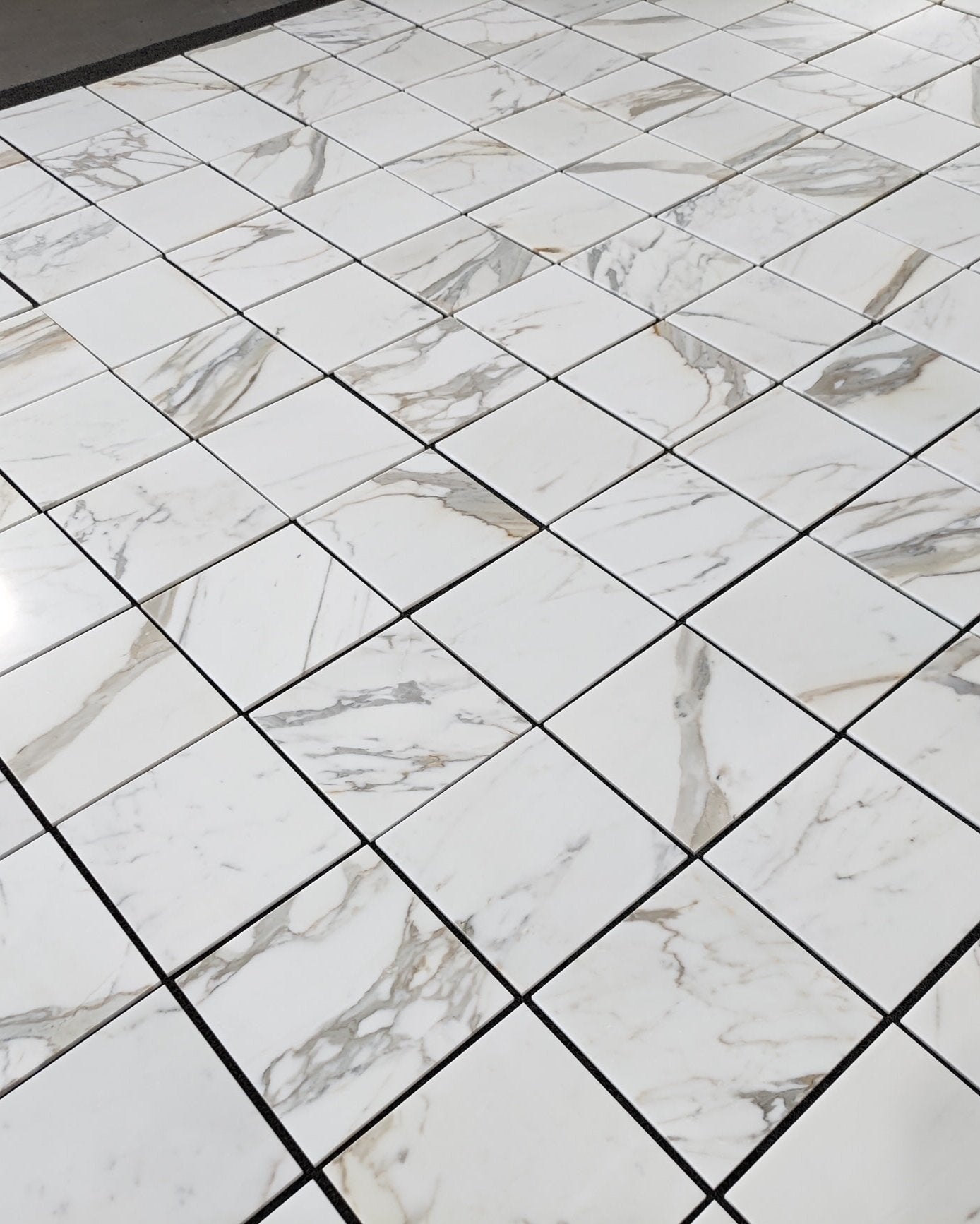 Calacatta Gold 12x12 marble tile, Available in honed or polished finish for sophisticated style