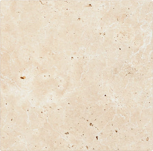 Ivory Travertine tumbled 18 x 18 tile with beige tones for rustic bathrooms and expansive designs.