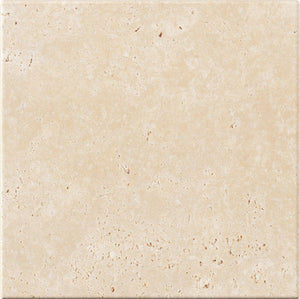 Ivory Travertine tumbled subway tile with beige tones for rustic shower walls and decorative accents.