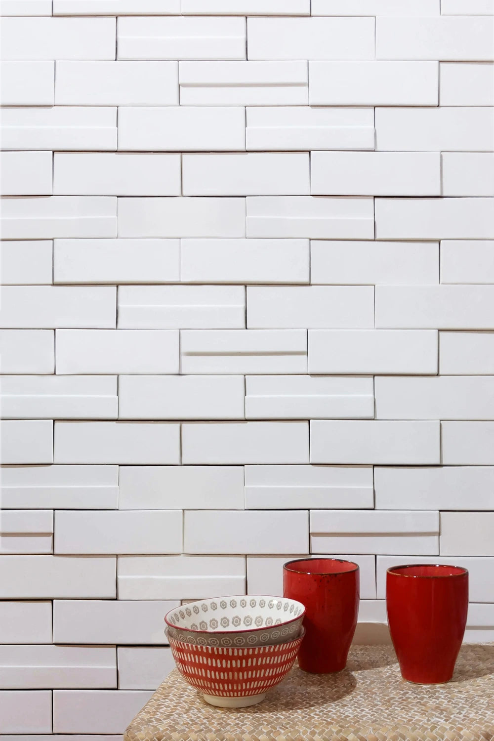 Fez Ivory Breeze glossy 2×6 ceramic wall tile installed in a bright interior.