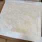 Ivory Travertine 24x24 Honed Filled_ in original Packaging for true judgment of its creamy beige tones with subtle veining