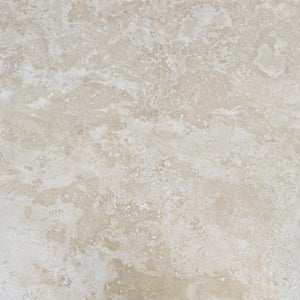 18×18 Field Tile showing honed and filled warm ivory-beige Ivory Travertine.