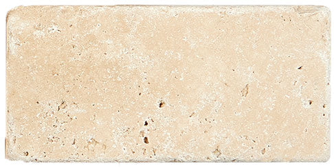 Ivory Travertine tumbled subway tile with beige tones for rustic shower walls and decorative accents.