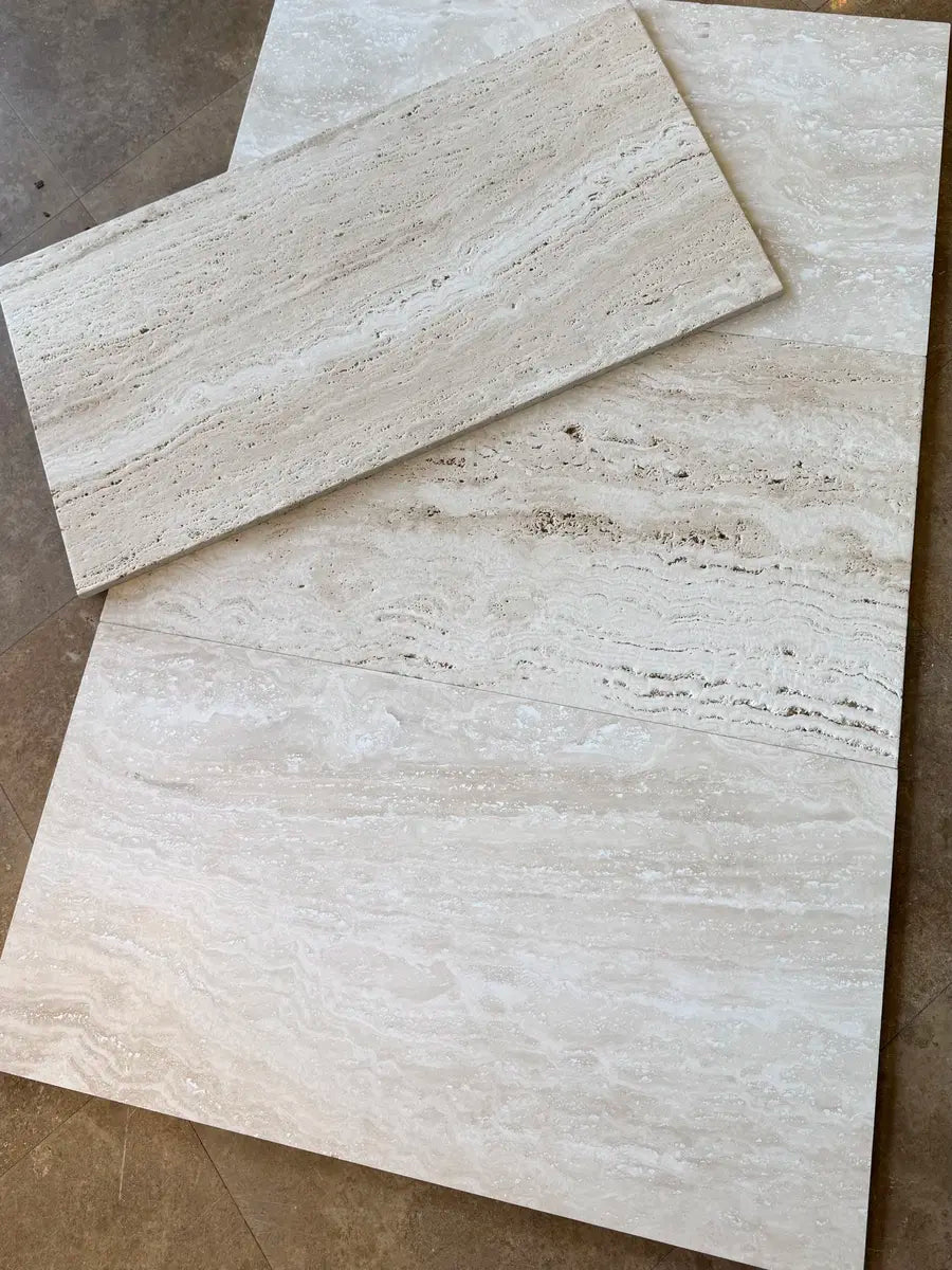 Honed and filled travertine vs honed and unfilled travertine in ivory color_ roman travertine vein cut