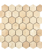 Ivory Travertine 2-Inch Hexagon Mosaic Tile in honed or tumbled finish with warm beige tones.