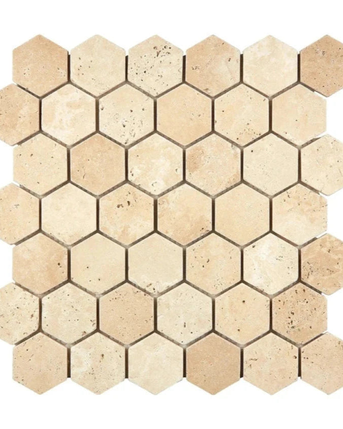 2-Inch Hexagon Mosaic showing tumbled warm ivory-beige Ivory Travertine.
