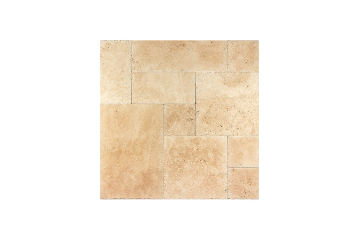Ivory Travertine Versailles pattern tile set in a honed finish, warm ivory-beige natural stone.