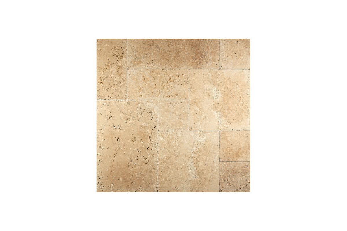 Ivory Travertine Versailles pattern tile set in a tumbled finish, warm ivory-beige natural stone.