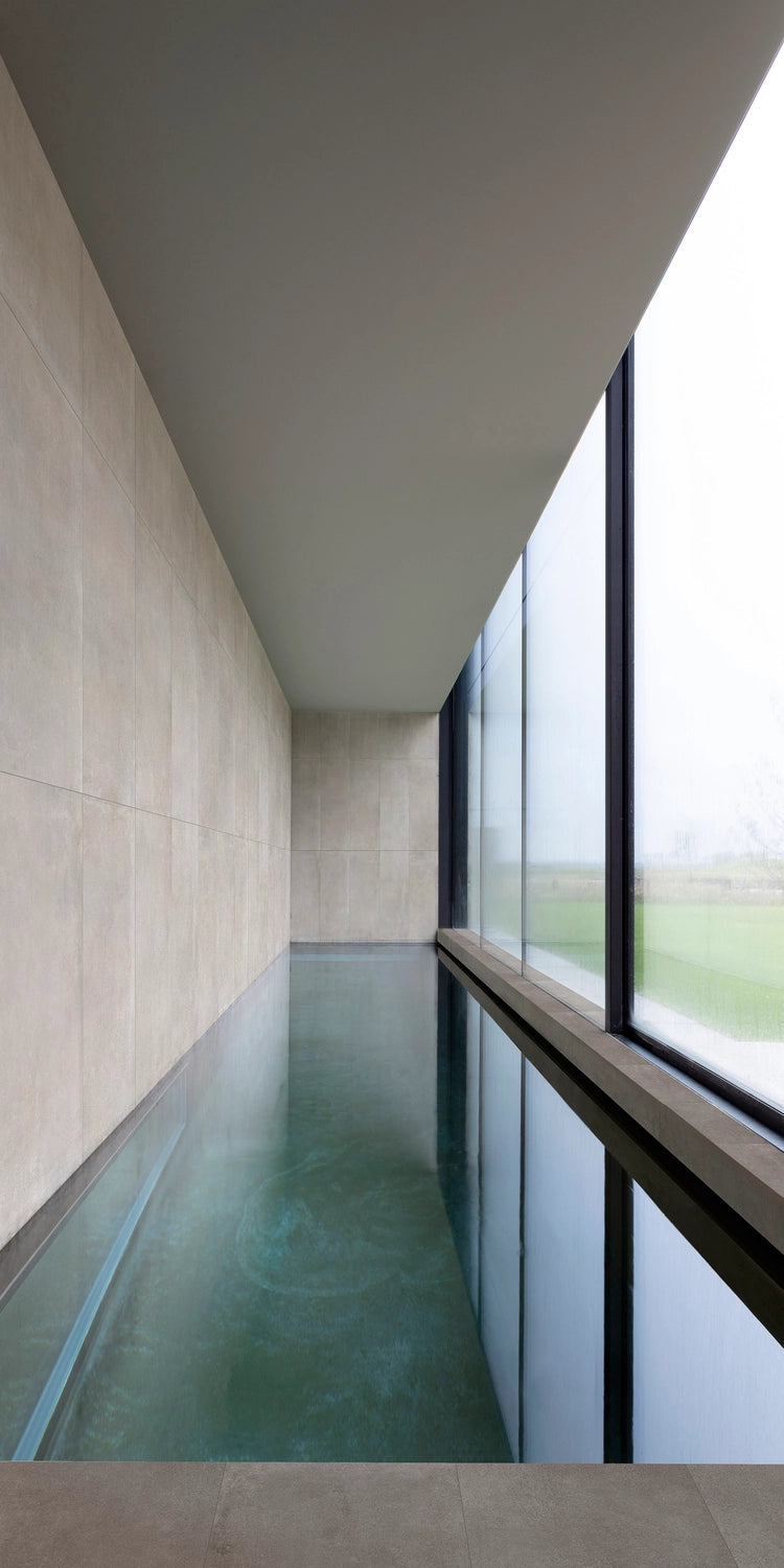 Urban Taupe 24x48 tile providing a neutral, sophisticated tone and slip resistance safety for indoor swimming pool.