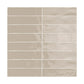 Desert Sand glossy ceramic tile from the ModLine Collection, providing neutral tones for versatile interiors.