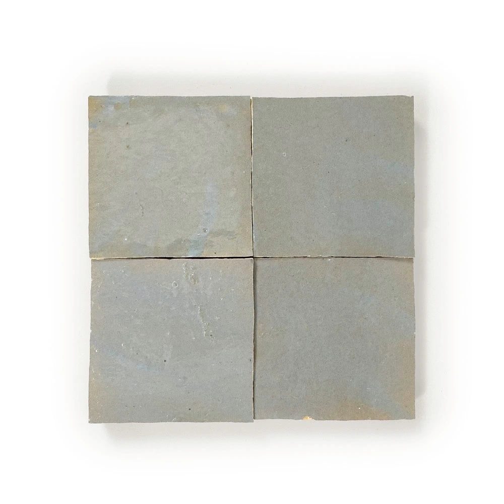 Four square Marrakech Gray Zellige tiles arranged in a grid on a white background