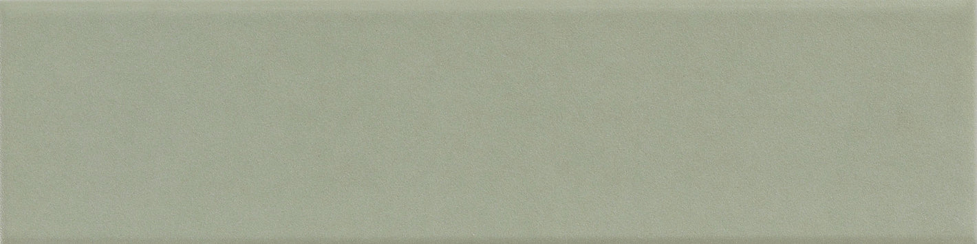 Meadow Green Sleek ceramic wall tile in a modern backsplash.