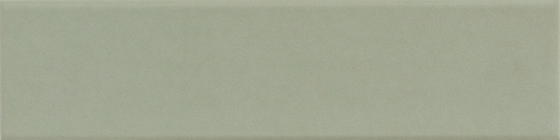 Meadow Green Sleek ceramic wall tile in a modern backsplash.