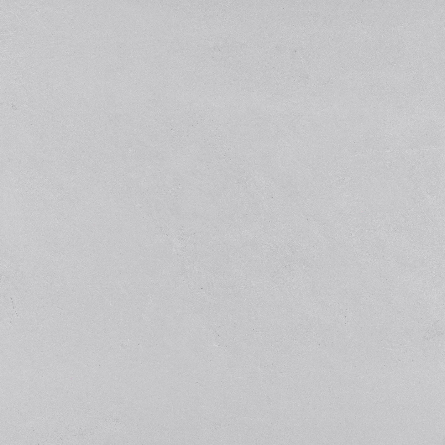 Frost White 36x36 matte porcelain tile from the Modern Canvas Collection, creating a minimalist living space.