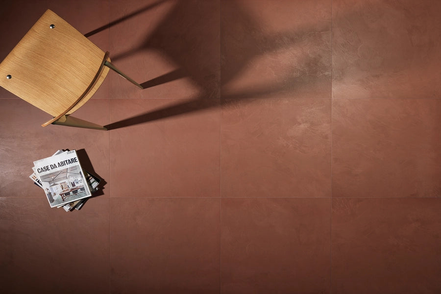 Modern Canvas Clay Red 36×36 matte porcelain tile installed on a high-traffic floor.