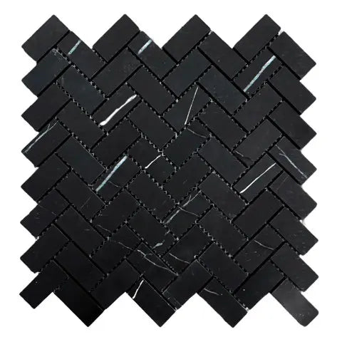 Nero Marquina 1x2 polished black marble herringbone mosaic tile for backsplashes and accent walls.