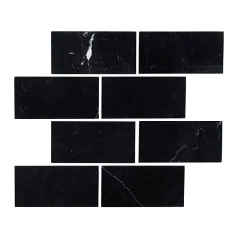 Nero Marquina 3x6 honed black marble subway tile with matte finish for walls and showers.