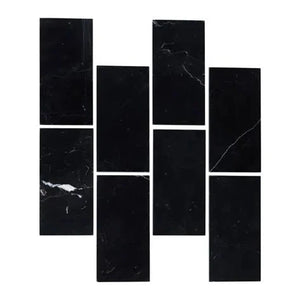 Nero Marquina 3x6 polished black marble subway tile with white veining for backsplashes.