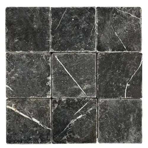 Nero Marquina marble 4×4 square tile with a tumbled finish.