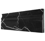 Nero Marquina polished marble baseboard with black and white veining for elegant wall transitions.